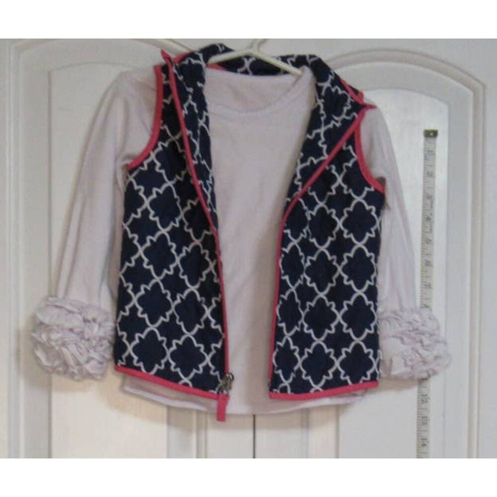 White Top and Blue Vest